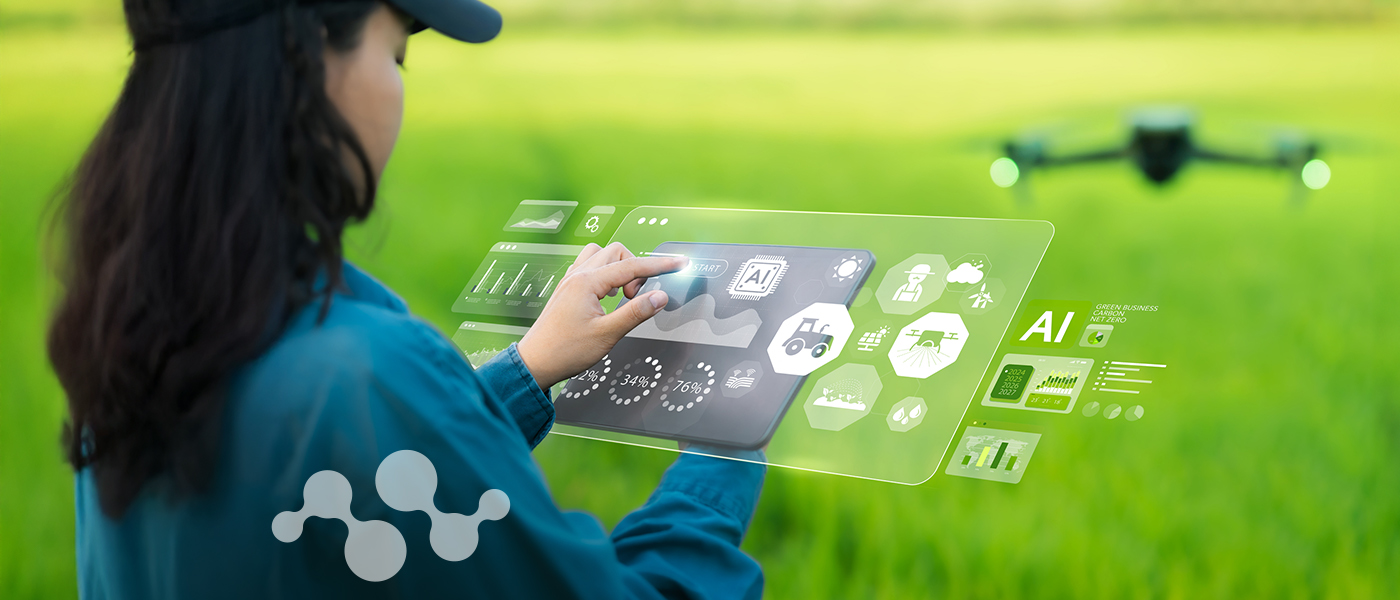 Female farmer in blue shirt and black cap interacting with holographic digital interface displaying AI analytics, charts, and agricultural data icons in a lush green farm field, illustrating smart agriculture technology integration